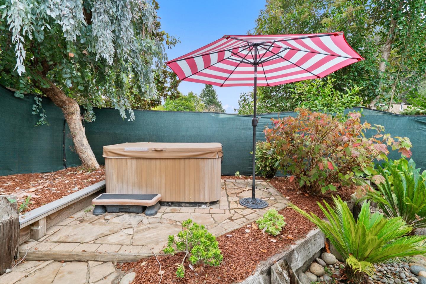 314 Hames Road Watsonville, CA 95076 - Photo 31 of 32 a view of a chair and table under an umbrella