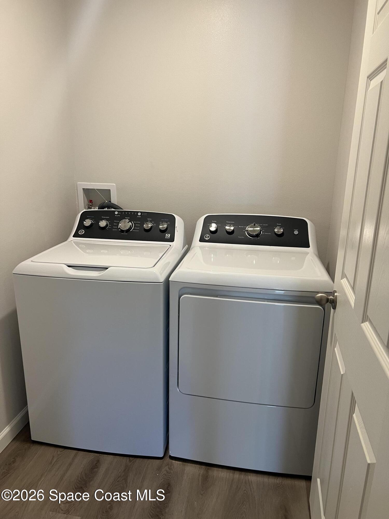 881 Hollahan Road Southeast Palm Bay, FL 32909 - Photo 16 of 21 a utility room with dryer and washer