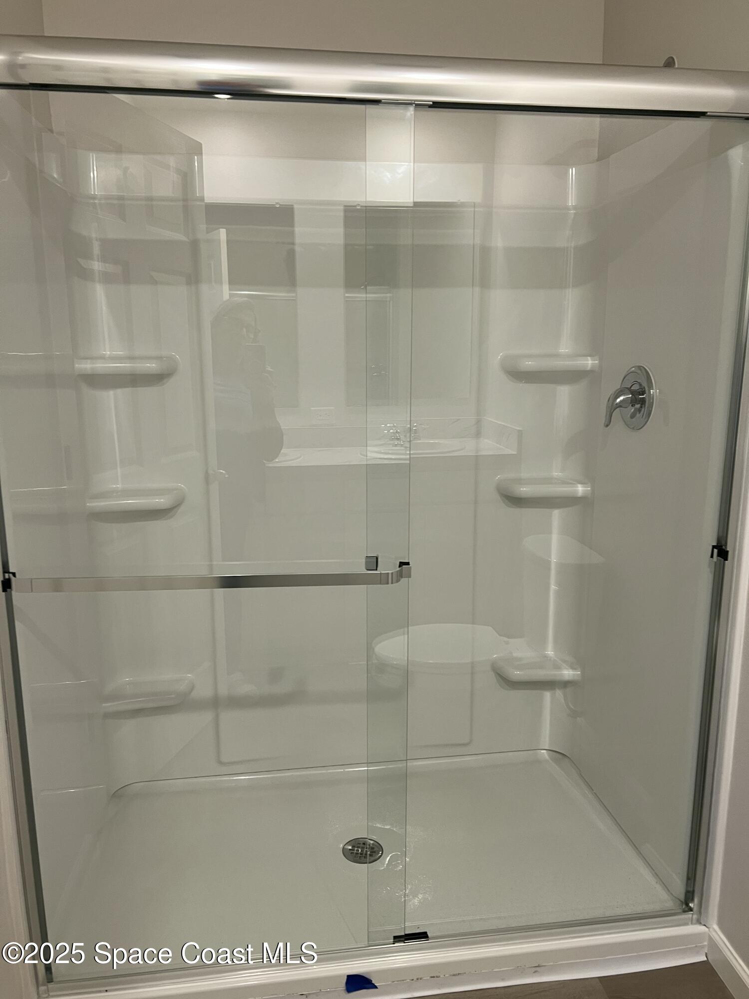 881 Hollahan Road Southeast Palm Bay, FL 32909 - Photo 20 of 21 a bathroom with a shower