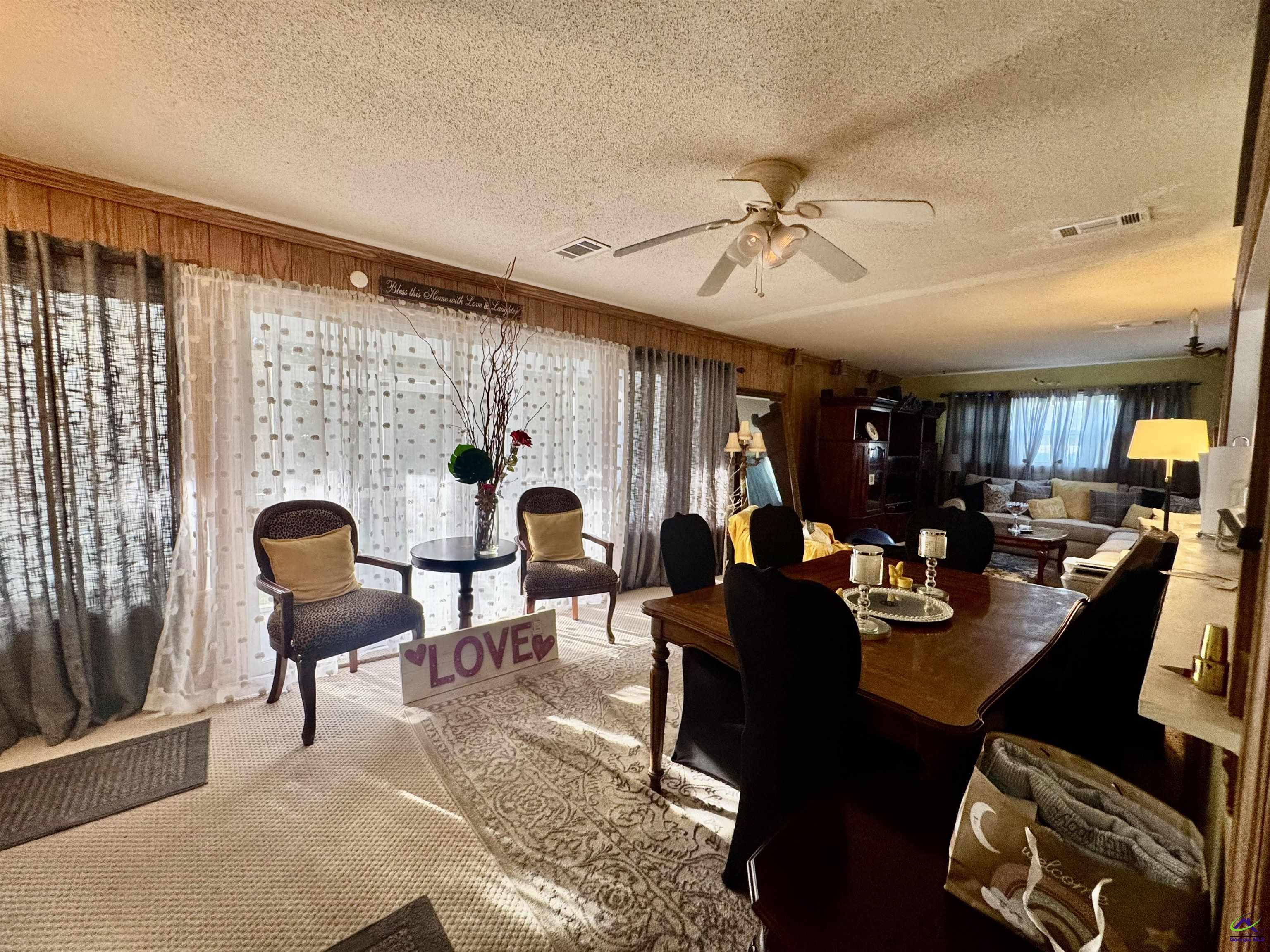 914 Adderton Street Americus, GA 31719 - Photo 15 of 53 a living room with furniture and a large window