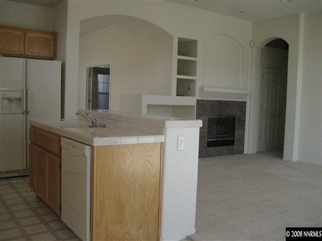9590 Oakley Lane Reno, NV 89521 - Photo 5 of 9 a utility room with dryer and washer