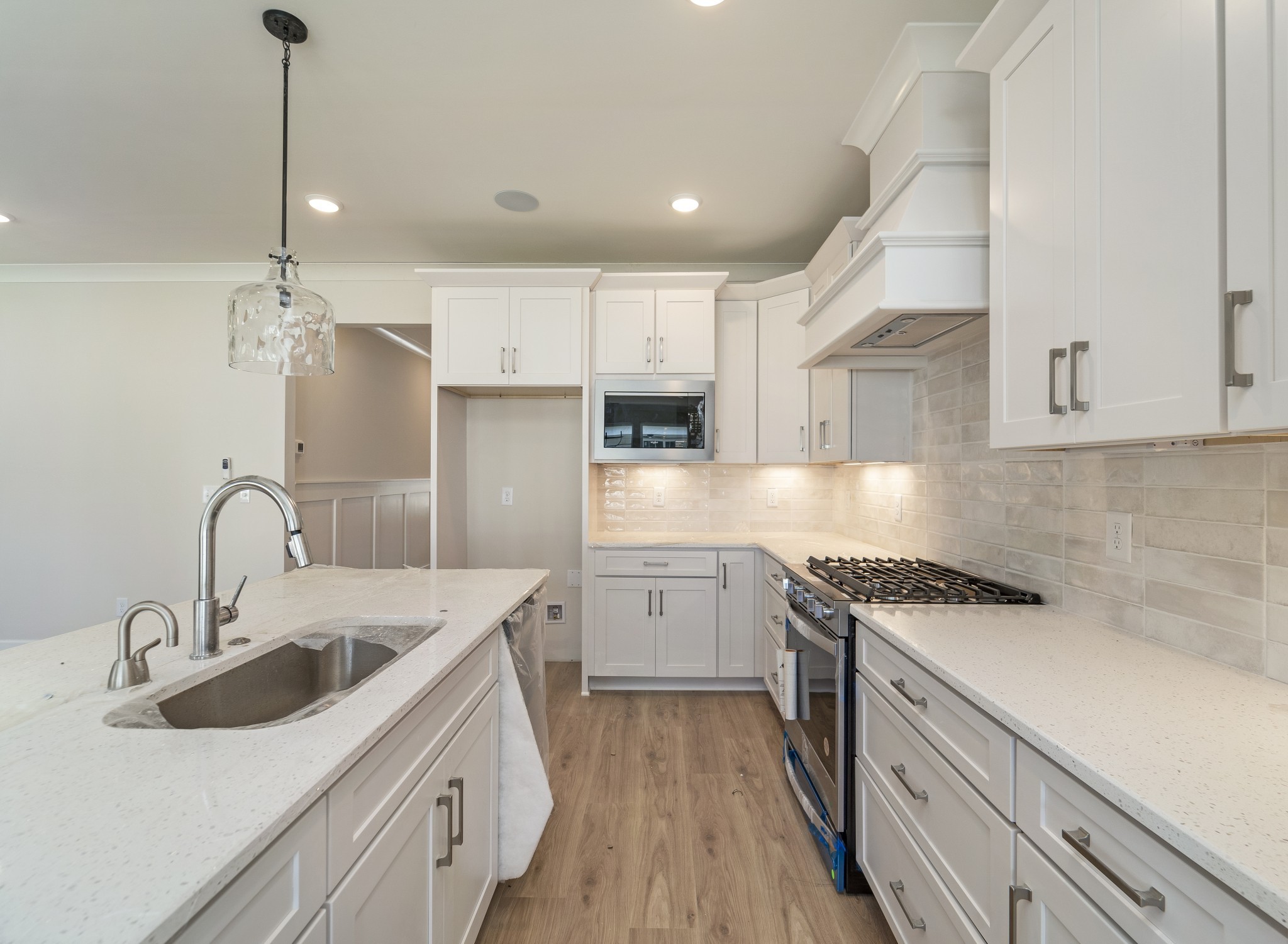 3005 Fanshaw Road Smyrna, TN 37167 - Photo 11 of 40 a kitchen with a sink a stove a refrigerator and cabinets