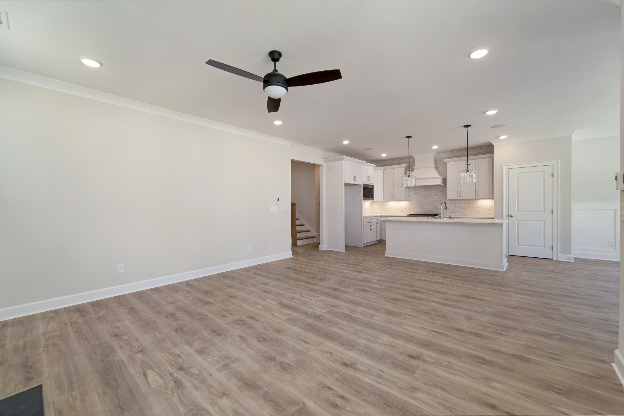 3005 Fanshaw Road Smyrna, TN 37167 - Photo 18 of 40 a view of a kitchen with a sink and a refrigerator