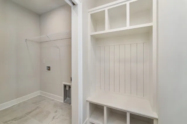 a view of an empty room with cabinet