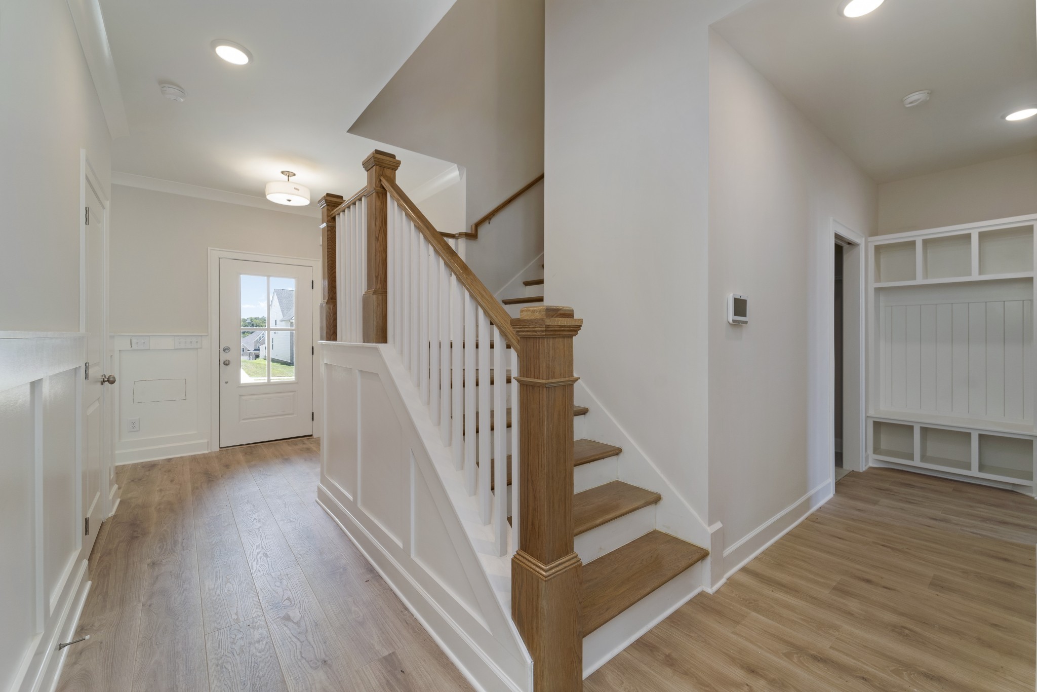 3005 Fanshaw Road Smyrna, TN 37167 - Photo 27 of 40 a view of a hallway with wooden floor and stairs
