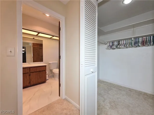 a bathroom with a tub and shower