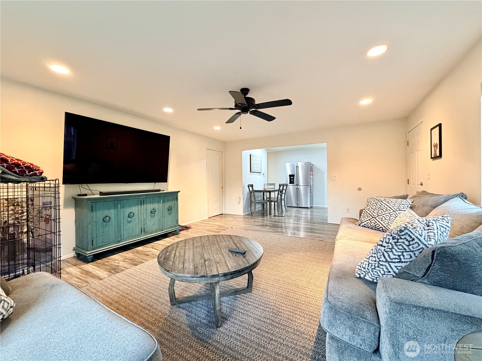 18902 133rd Place Southeast Renton, WA 98058 - Photo 20 of 40 a living room with furniture and a flat screen tv