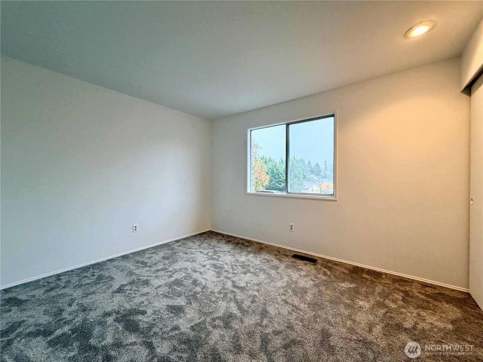 18902 133rd Place Southeast Renton, WA 98058 - Photo 33 of 40 an empty room with windows