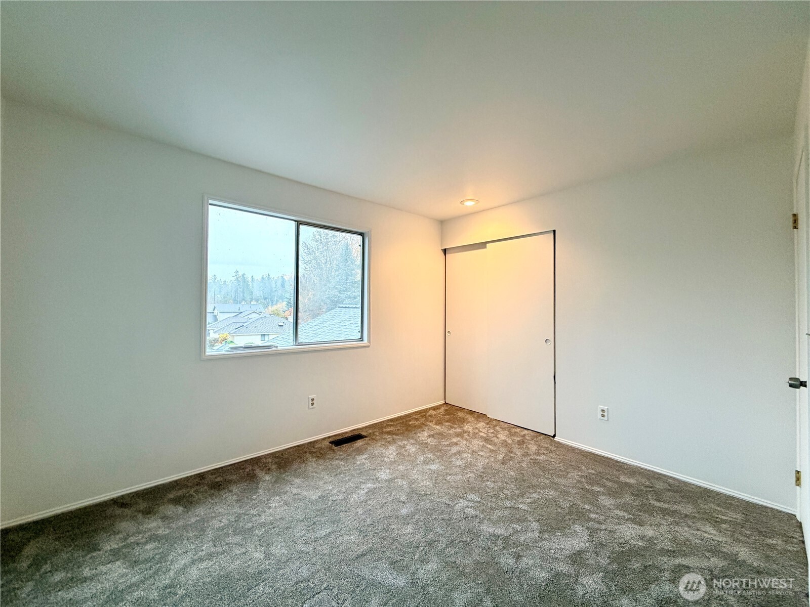 18902 133rd Place Southeast Renton, WA 98058 - Photo 34 of 40 an empty room with a window