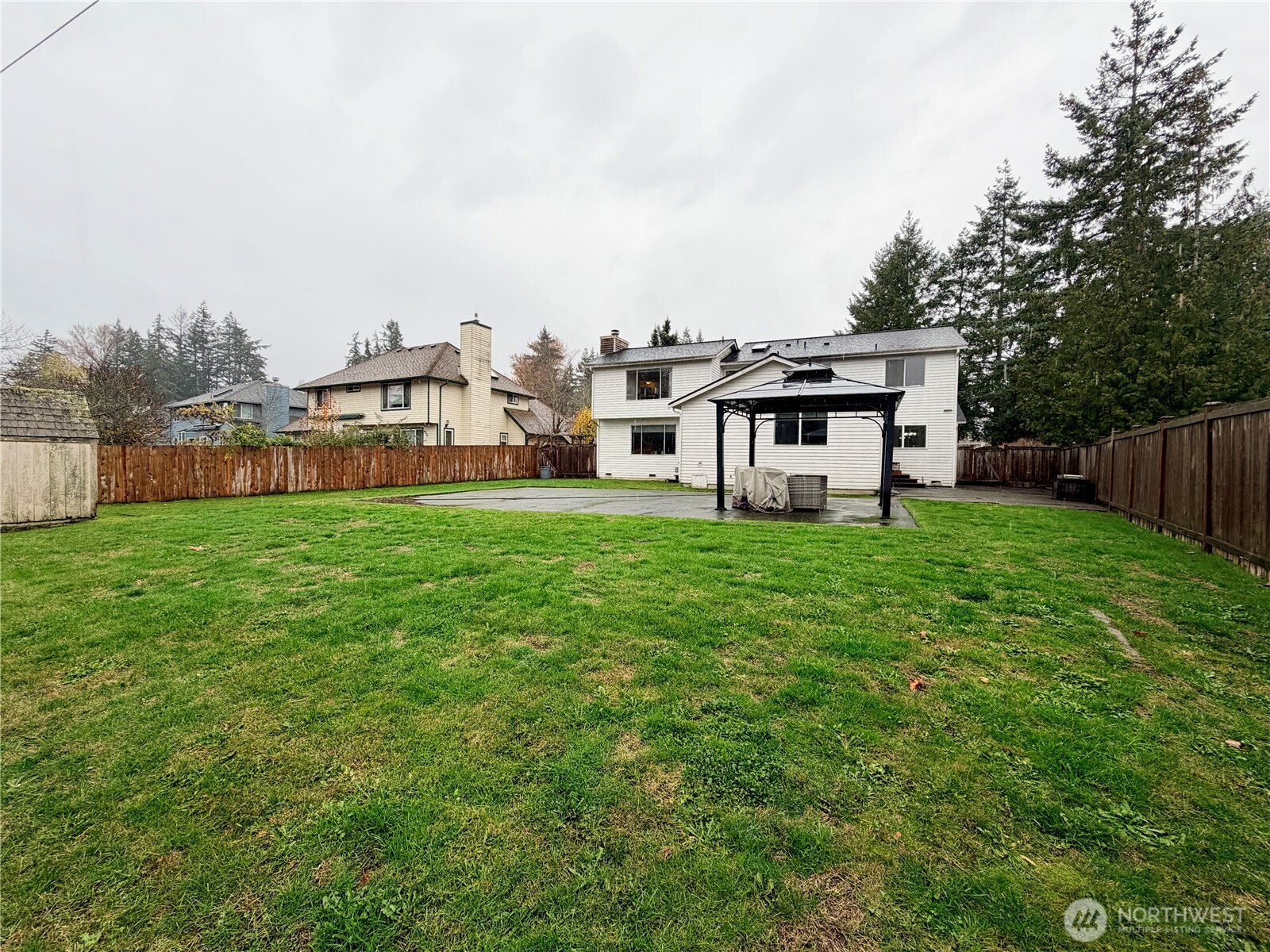 18902 133rd Place Southeast Renton, WA 98058 - Photo 39 of 40 a view of a house with a big yard and large trees