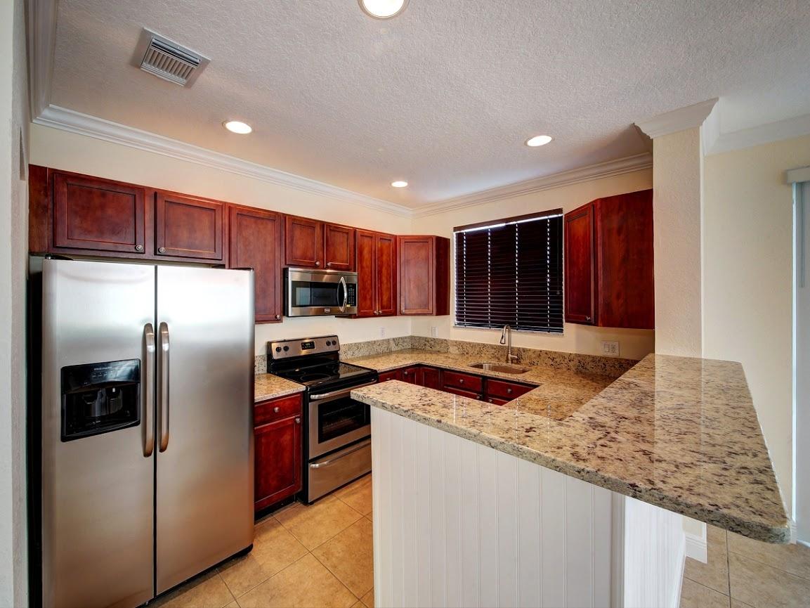 3087 Laurel Ridge Circle Riviera Beach, FL 33404 - Photo 1 of 29 gourmet kitchen