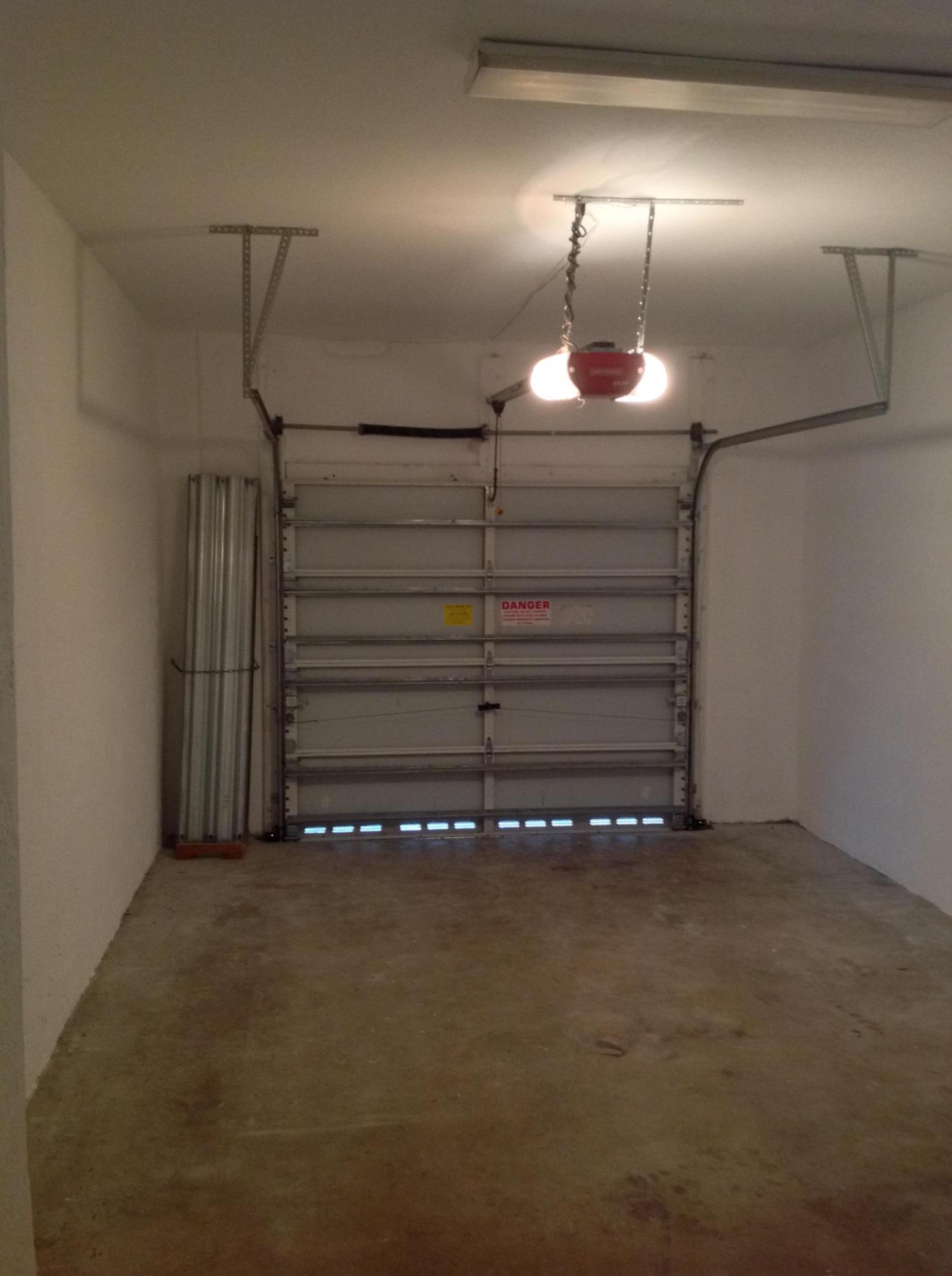 3087 Laurel Ridge Circle Riviera Beach, FL 33404 - Photo 16 of 29 Garage/Shutters