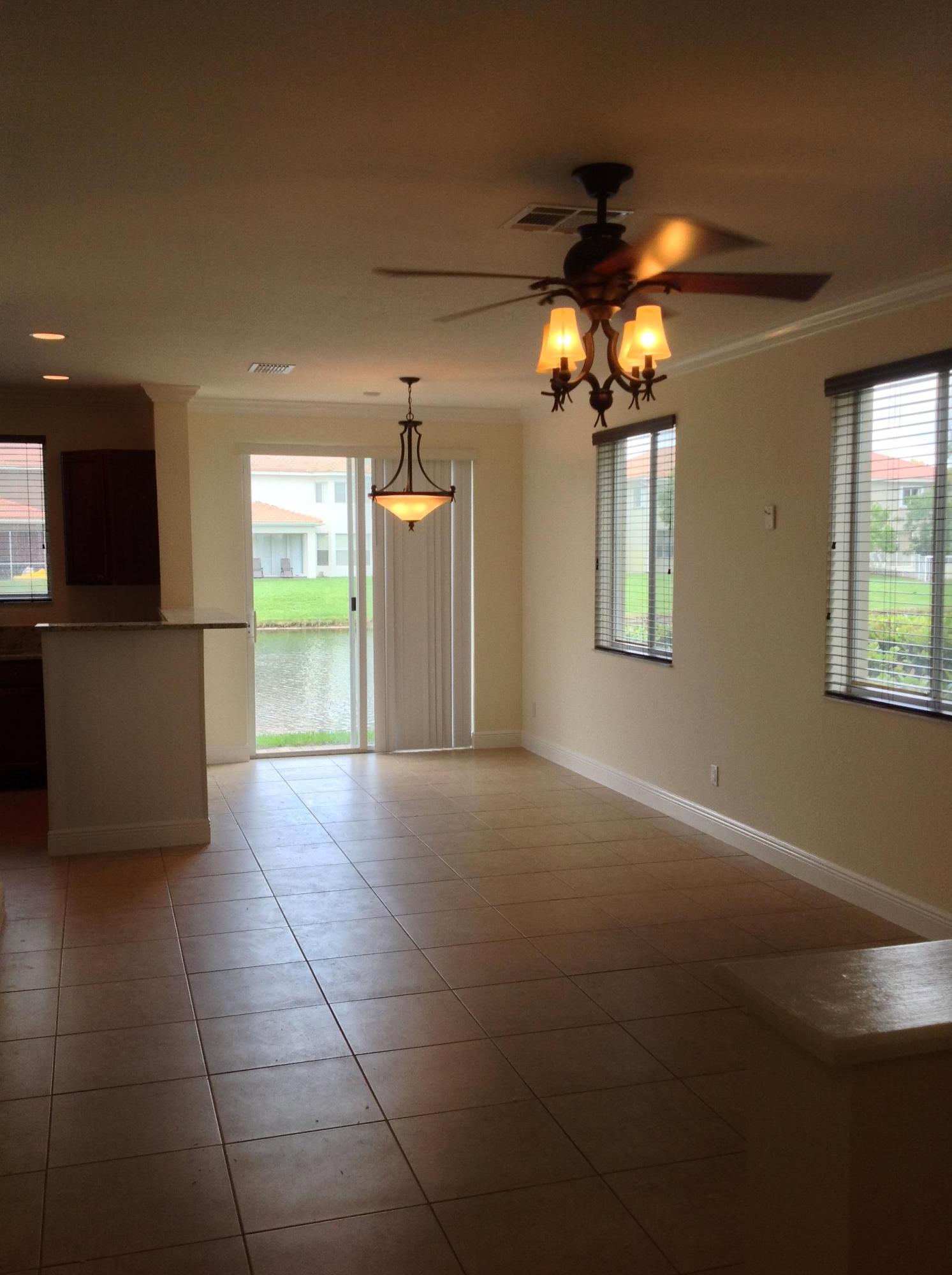 3087 Laurel Ridge Circle Riviera Beach, FL 33404 - Photo 6 of 29 Living/Dining
