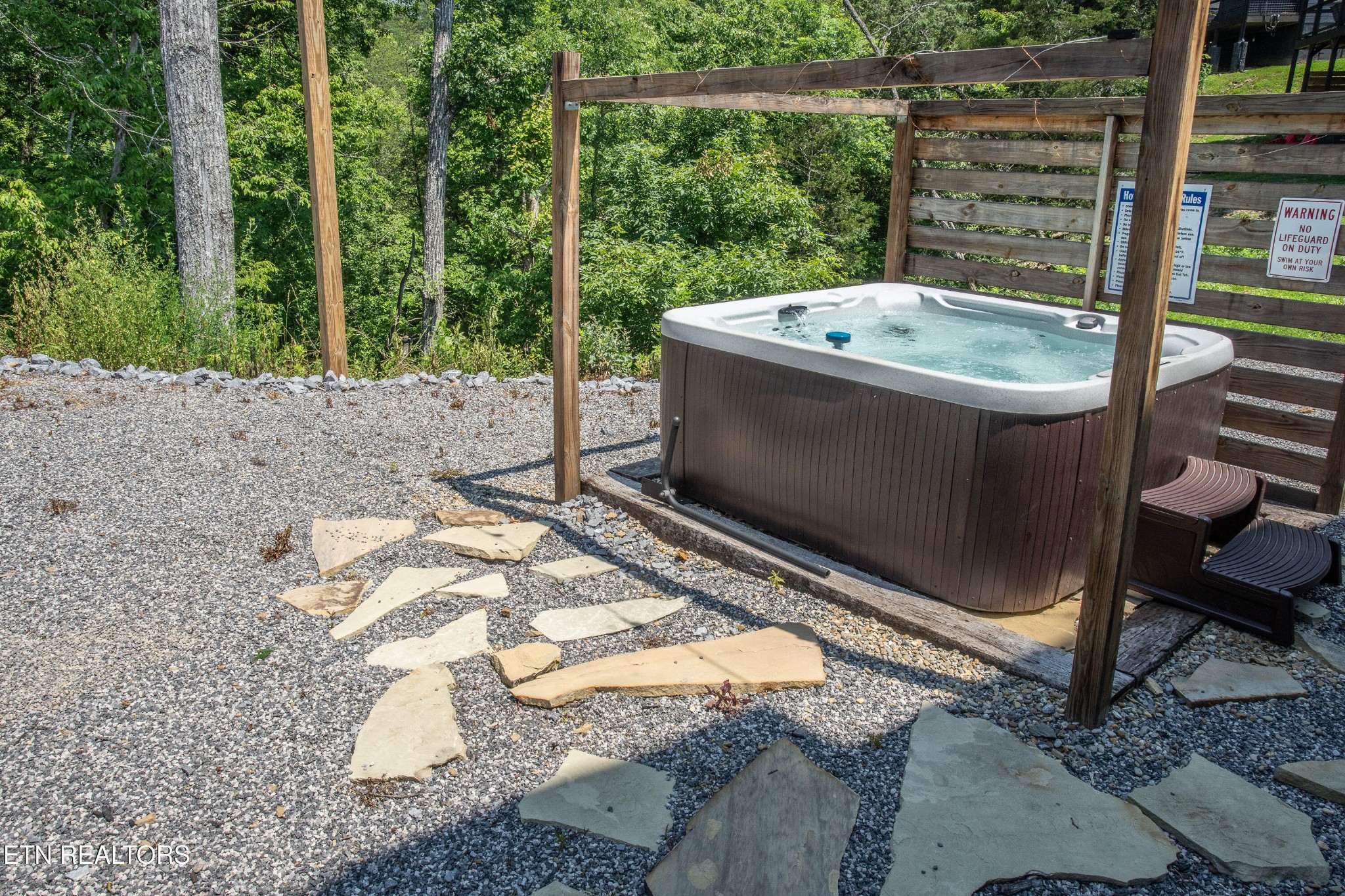 2033 Eagle Feather Drive Sevierville, TN 37876 - Photo 14 of 27 a bath tub sitting in a yard