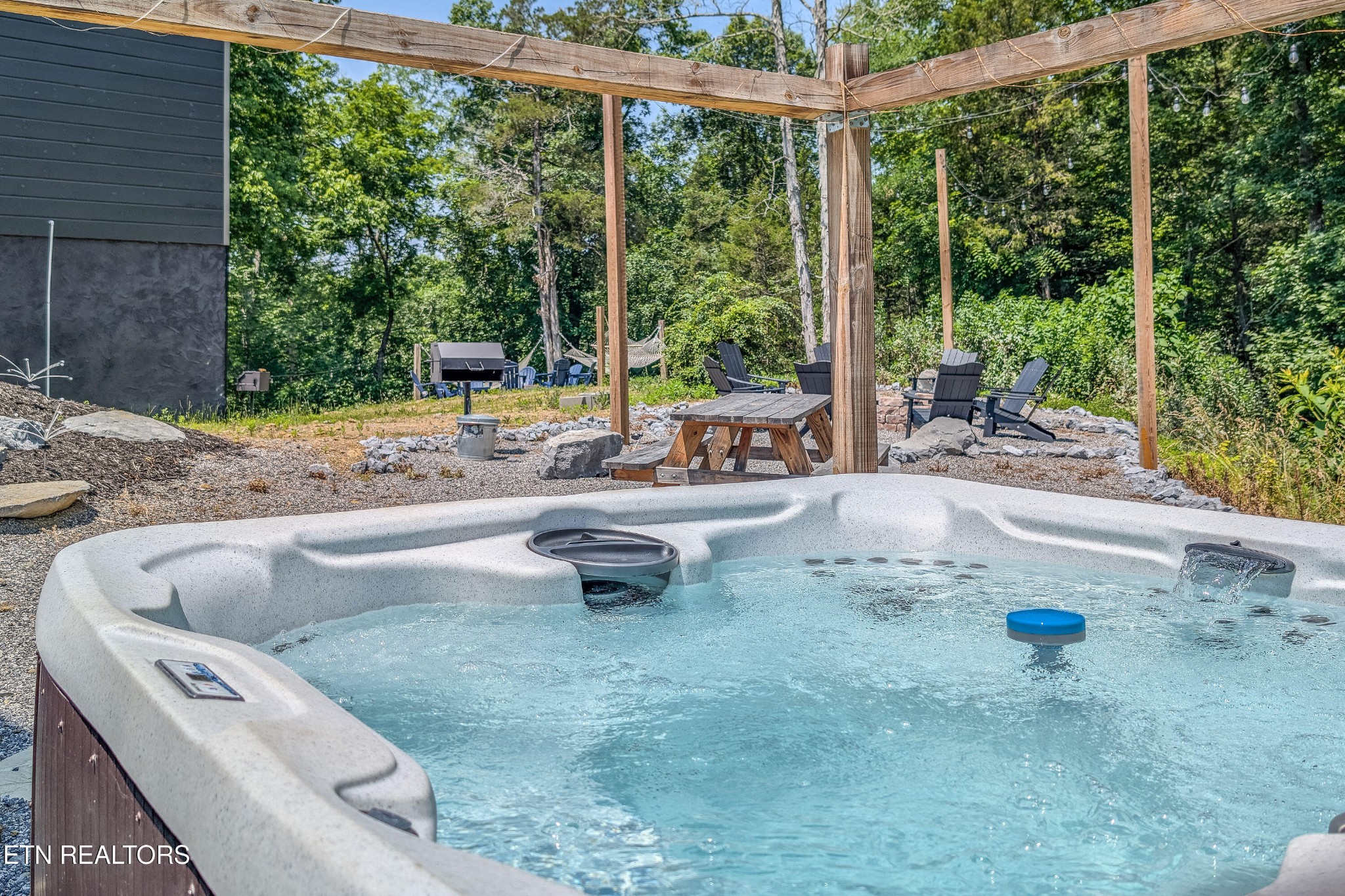 2033 Eagle Feather Drive Sevierville, TN 37876 - Photo 15 of 27 a view of backyard with swimming pool and outdoor seating
