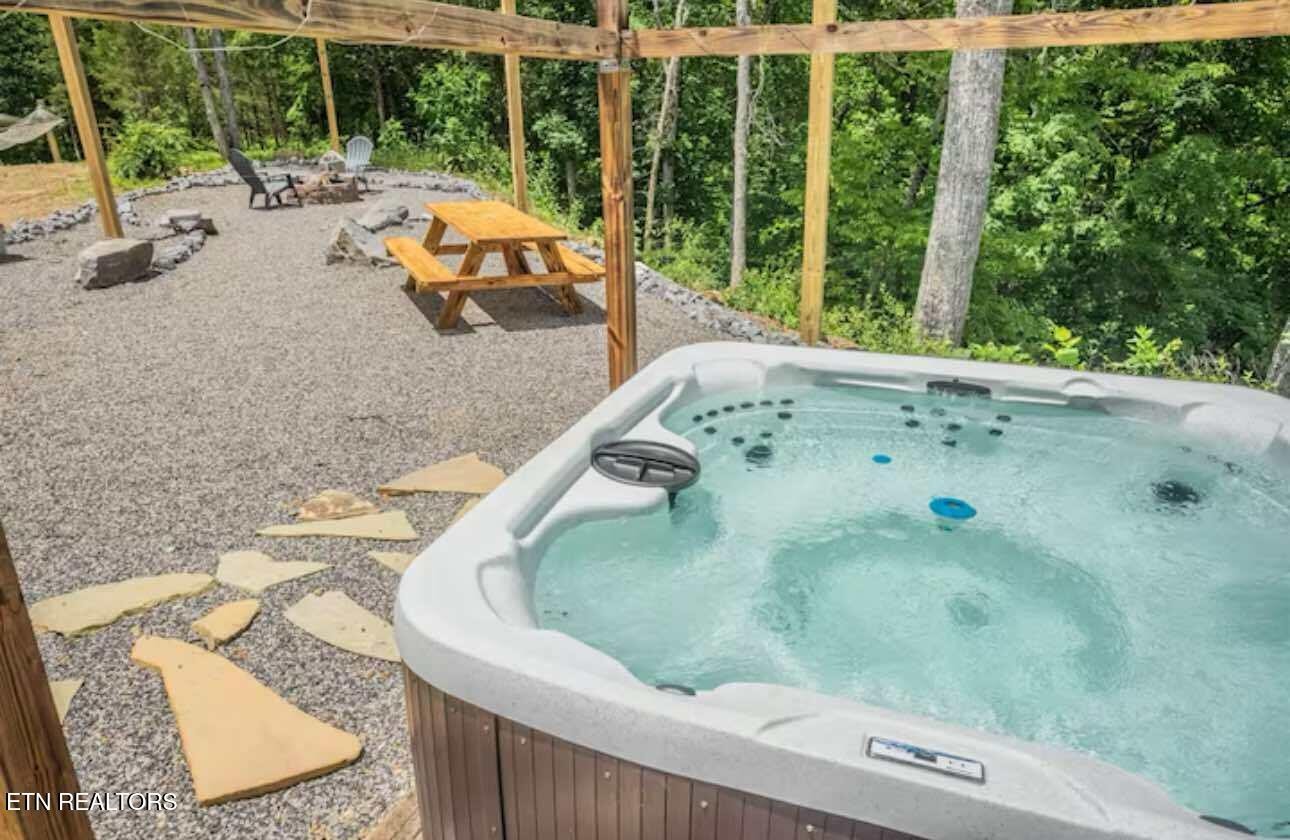 2033 Eagle Feather Drive Sevierville, TN 37876 - Photo 16 of 27 swimming pool view with a sitting space