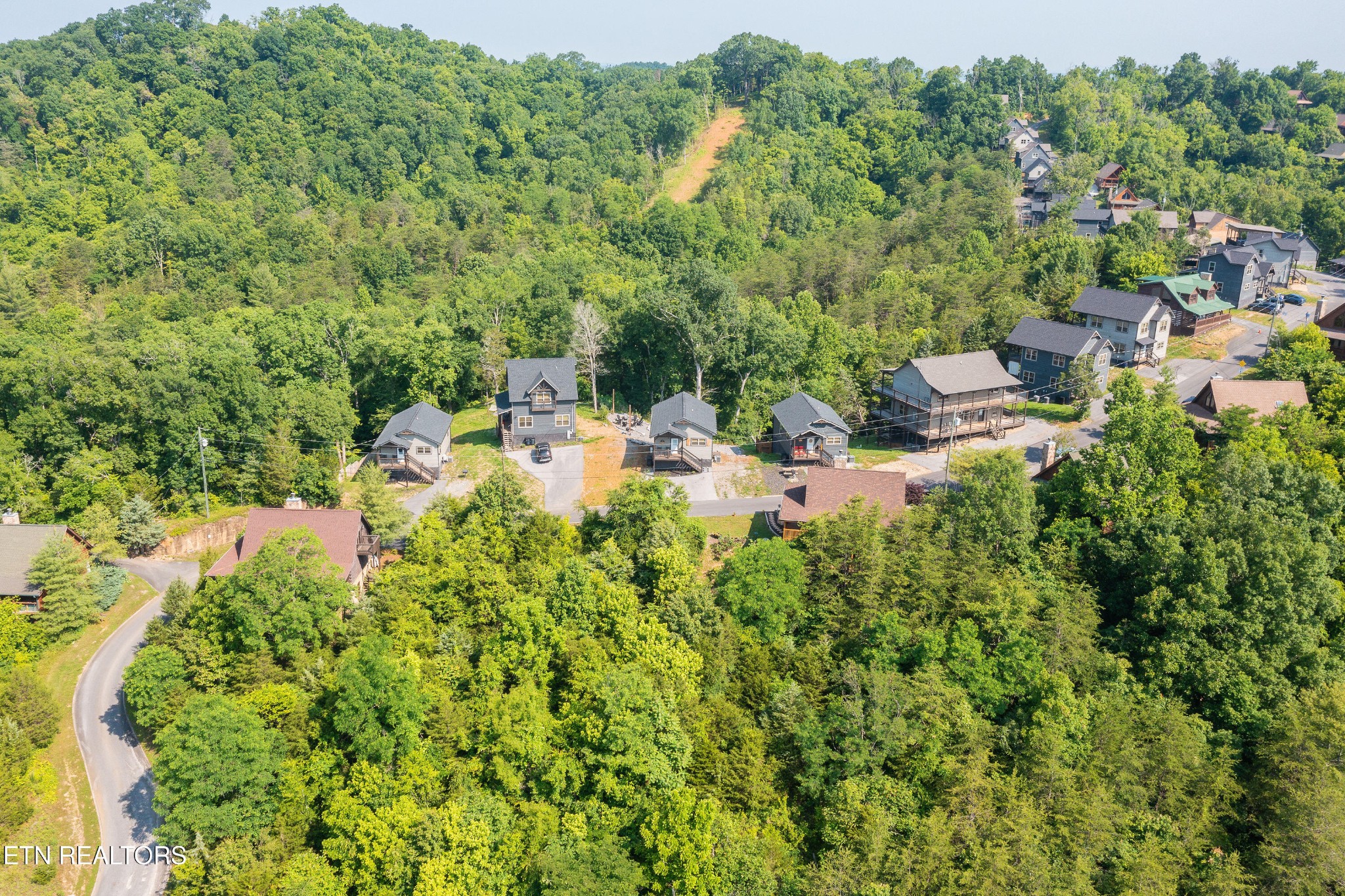 2033 Eagle Feather Drive Sevierville, TN 37876 - Photo 3 of 27 an aerial view of residential house with outdoor space and trees all around