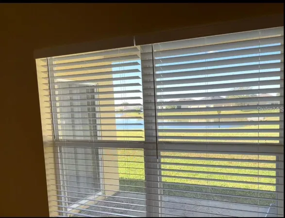 a view of a room with a window