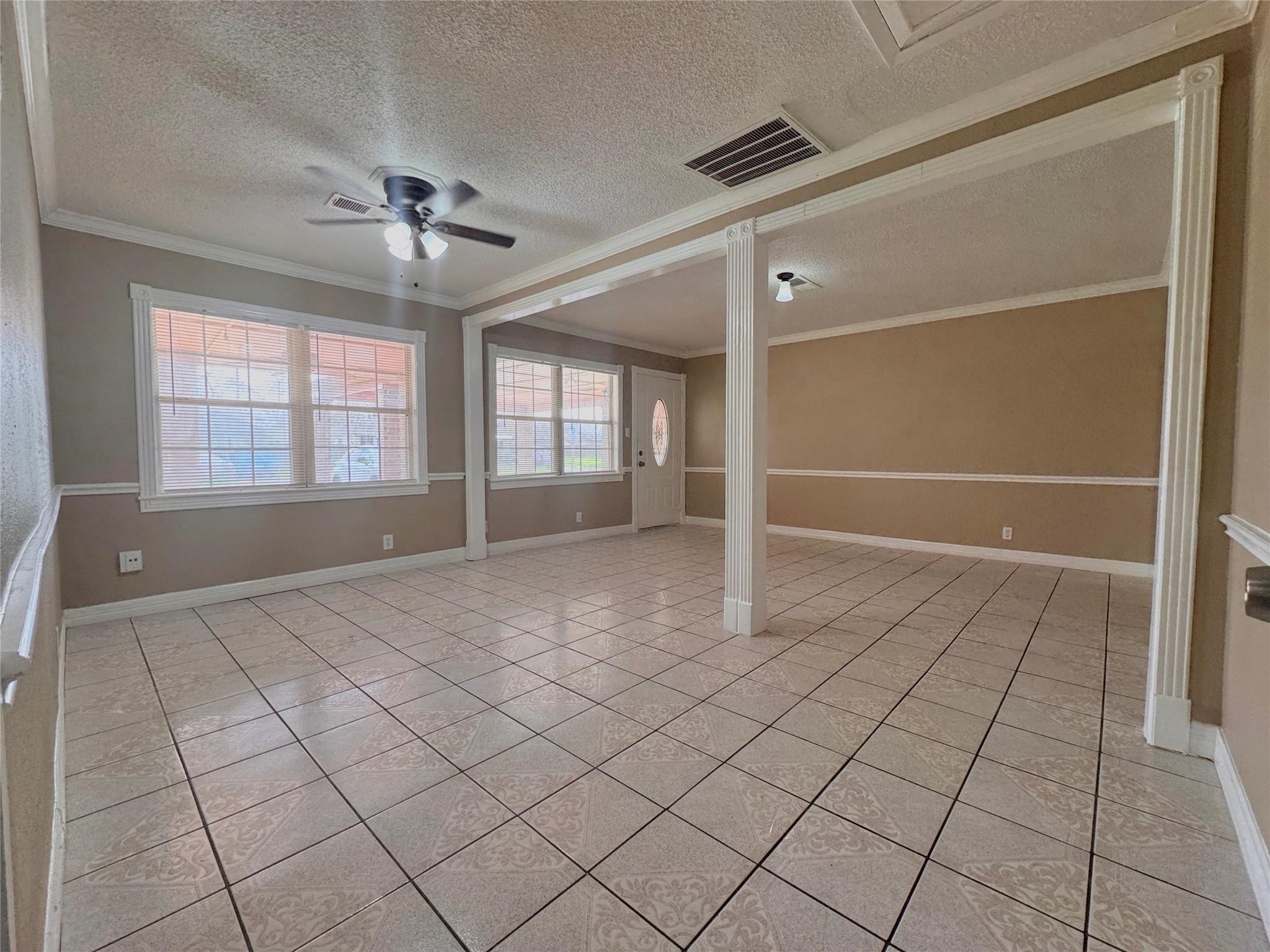6602 Clemson Street Houston, TX 77092 - Photo 2 of 13 a view of an empty room with a window