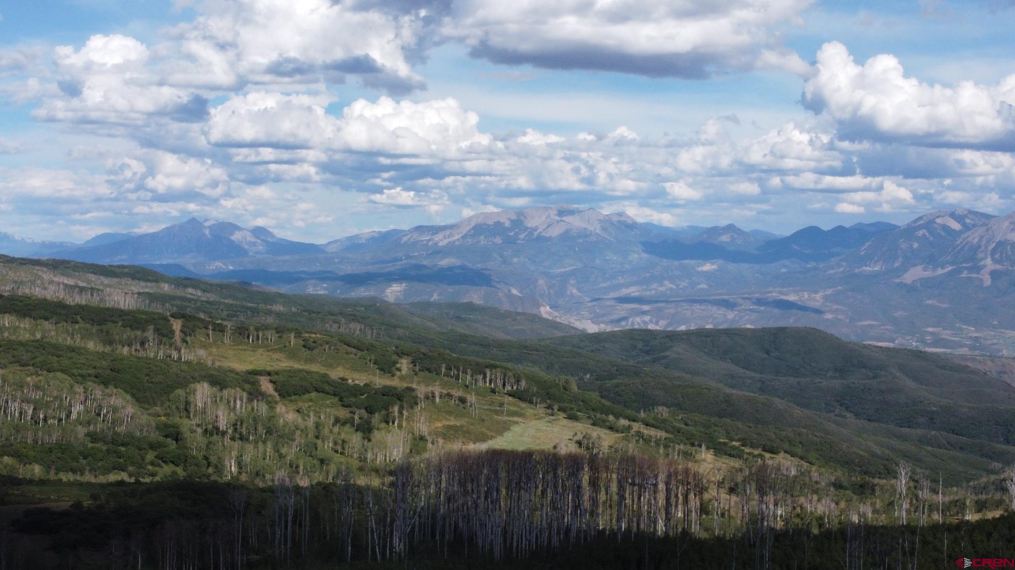 a view of lake with mountain in the back