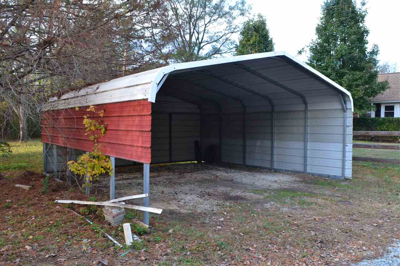 4711 Bragg Road Durham, NC 27704 - Photo 18 of 25 Lots of room for covered parking with this home. 2 car garage and also 2 car carport. 2 Car Carport