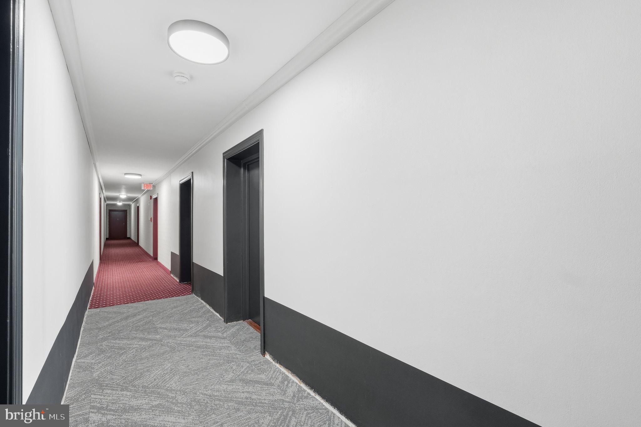 1300 South Arlington Ridge Road, Unit 204 Arlington, VA 22202 - Photo 22 of 35 a hallway with closet