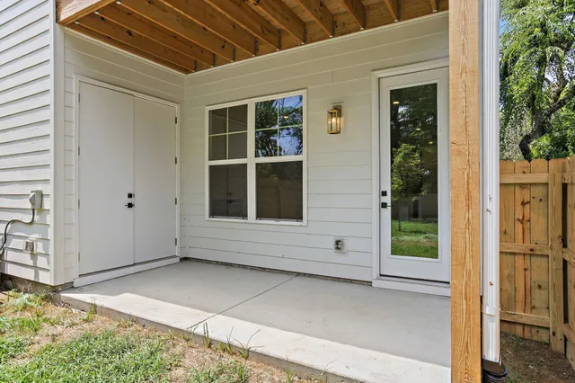 a view of a backyard with a garden and plants