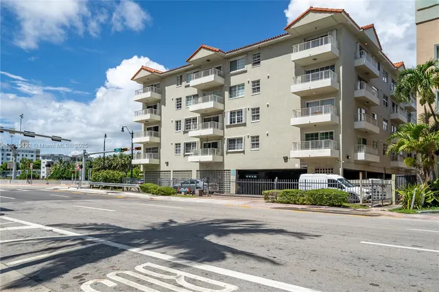a front view of a building with street view