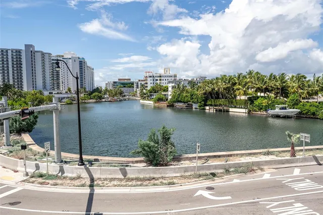 a view of a glass door and a living room
