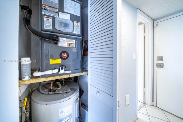 a kitchen with a stove oven and sink