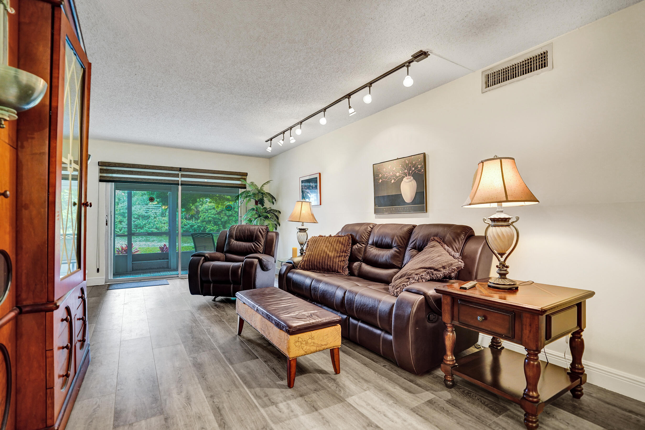 1033 Ainslie C Boca Raton, FL 33434 - Photo 17 of 42 a living room with furniture