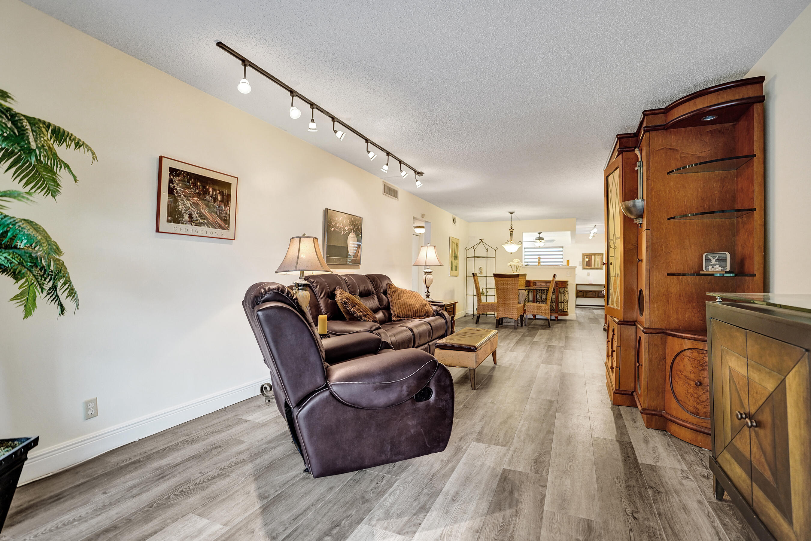 1033 Ainslie C Boca Raton, FL 33434 - Photo 21 of 42 a living room with furniture