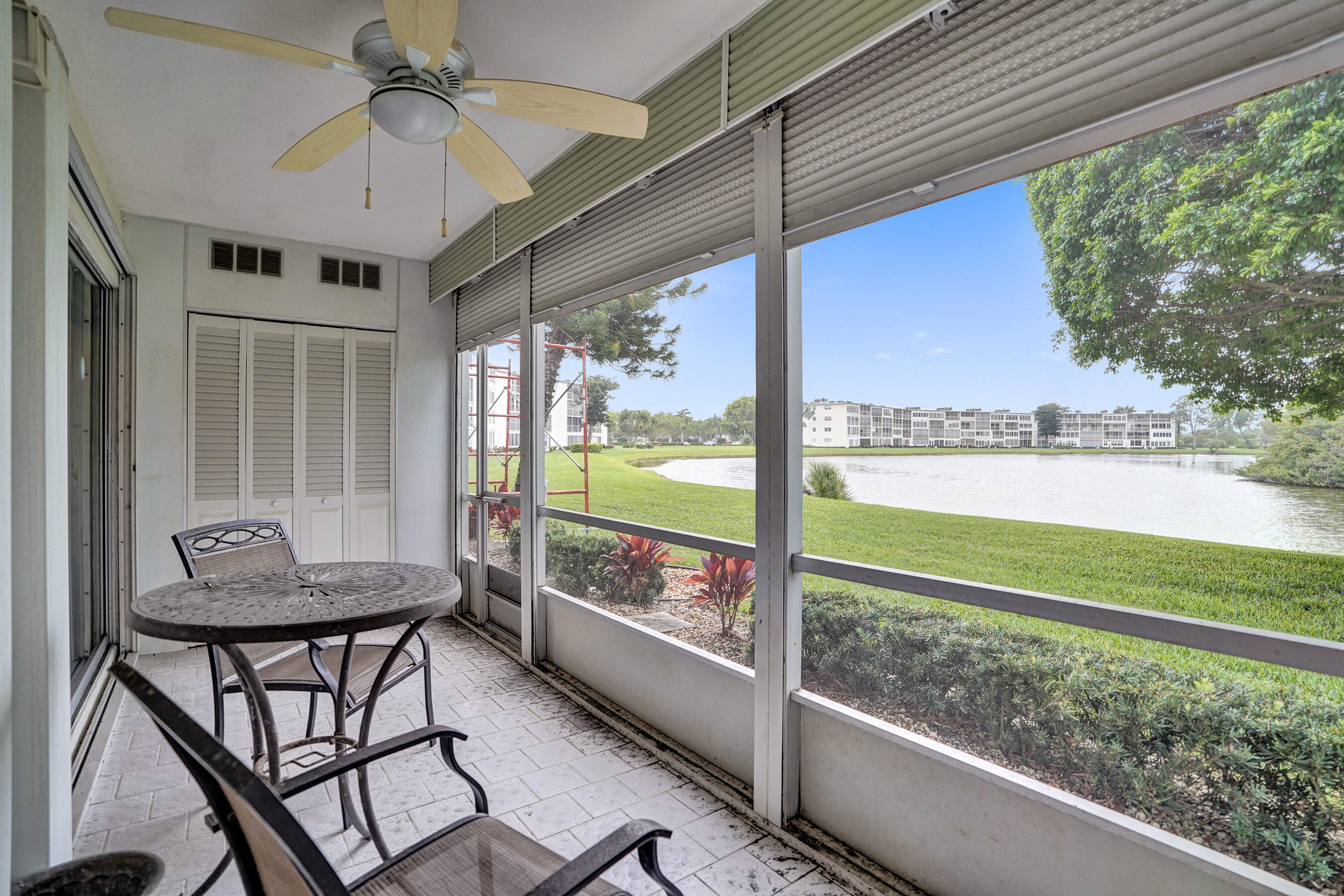1033 Ainslie C Boca Raton, FL 33434 - Photo 35 of 42 a view of a room with furniture and a window