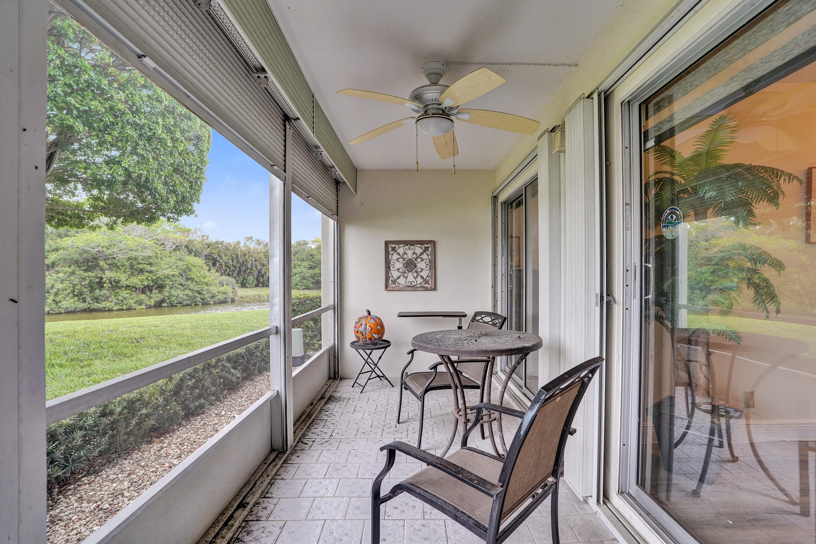 1033 Ainslie C Boca Raton, FL 33434 - Photo 37 of 42 a outdoor space with chairs