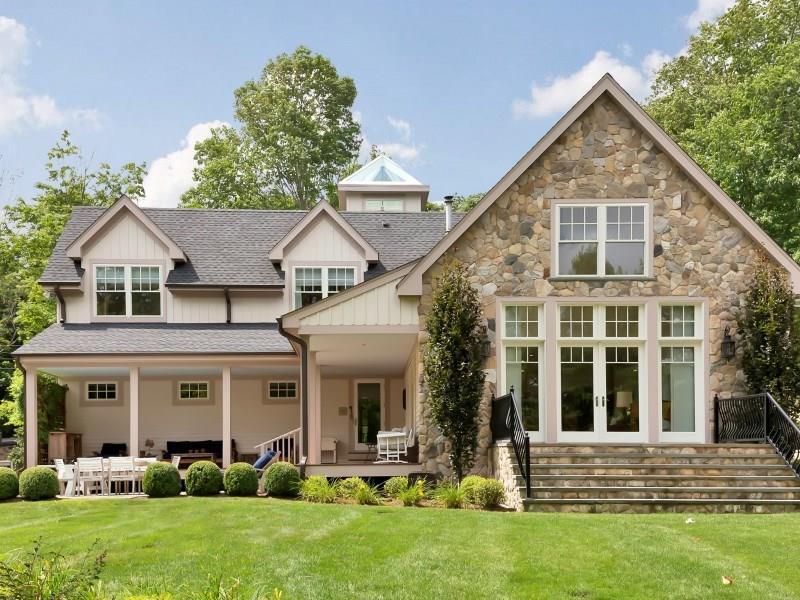 55 Wilton Road East Ridgefield, CT 06877 - Photo 1 of 1 front view of a house with a yard