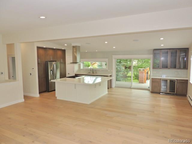 3255 Field Street Wheat Ridge, CO 80033 - Photo 12 of 35 a view of a kitchen with a sink and a large window