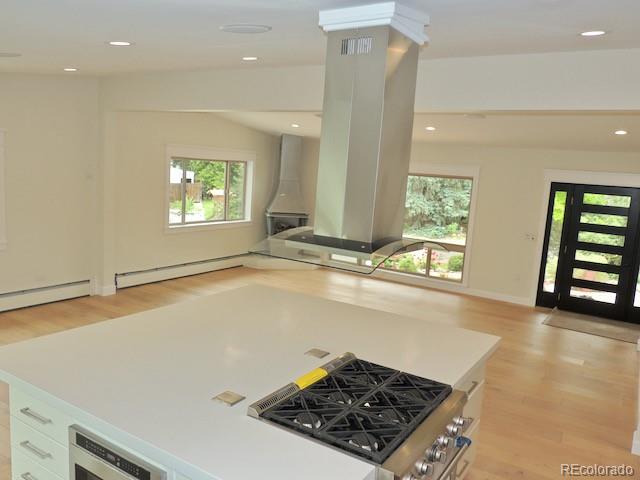 3255 Field Street Wheat Ridge, CO 80033 - Photo 14 of 35 a view of a kitchen with a sink and a stove top oven