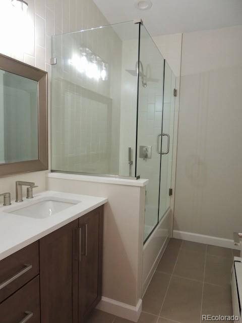 3255 Field Street Wheat Ridge, CO 80033 - Photo 17 of 35 a bathroom with a sink and a mirror