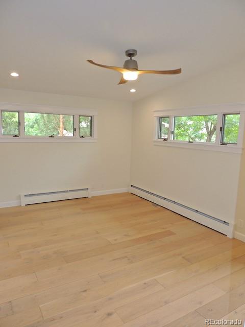 3255 Field Street Wheat Ridge, CO 80033 - Photo 20 of 35 an empty room with a window and ceiling fan