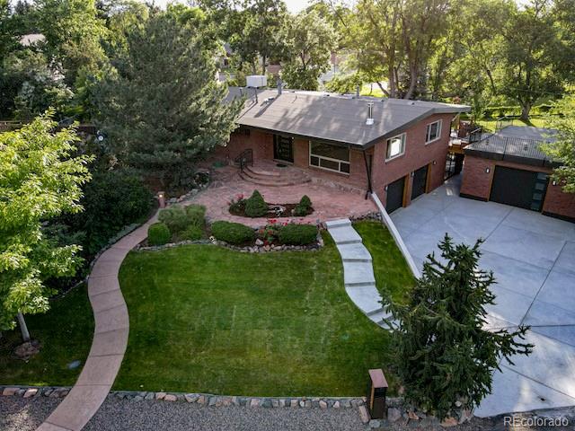 3255 Field Street Wheat Ridge, CO 80033 - Photo 2 of 35 a view of a garden with sitting area