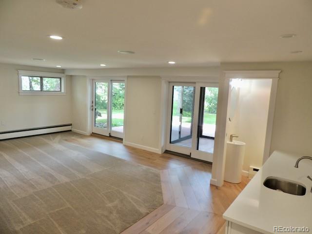 3255 Field Street Wheat Ridge, CO 80033 - Photo 26 of 35 wooden floor in an empty room with a window
