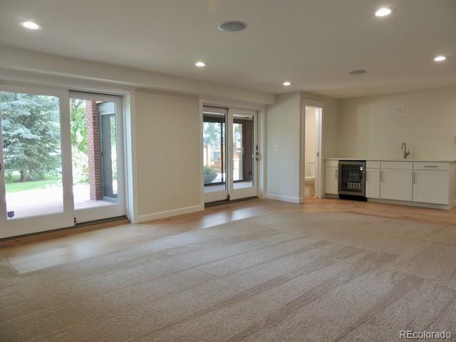 3255 Field Street Wheat Ridge, CO 80033 - Photo 28 of 35 a view of a livingroom with an empty space and a window