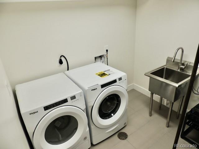 3255 Field Street Wheat Ridge, CO 80033 - Photo 32 of 35 a utility room with dryer and washer