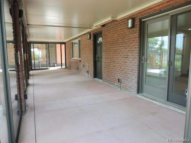 3255 Field Street Wheat Ridge, CO 80033 - Photo 33 of 35 a view of a hallway with wooden floor