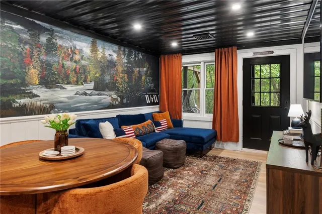 a backyard of a house with outdoor seating