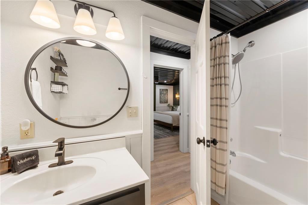 120 Brookhaven Trail Blue Ridge, GA 30513 - Photo 65 of 100 a bathroom with a sink a toilet and a mirror