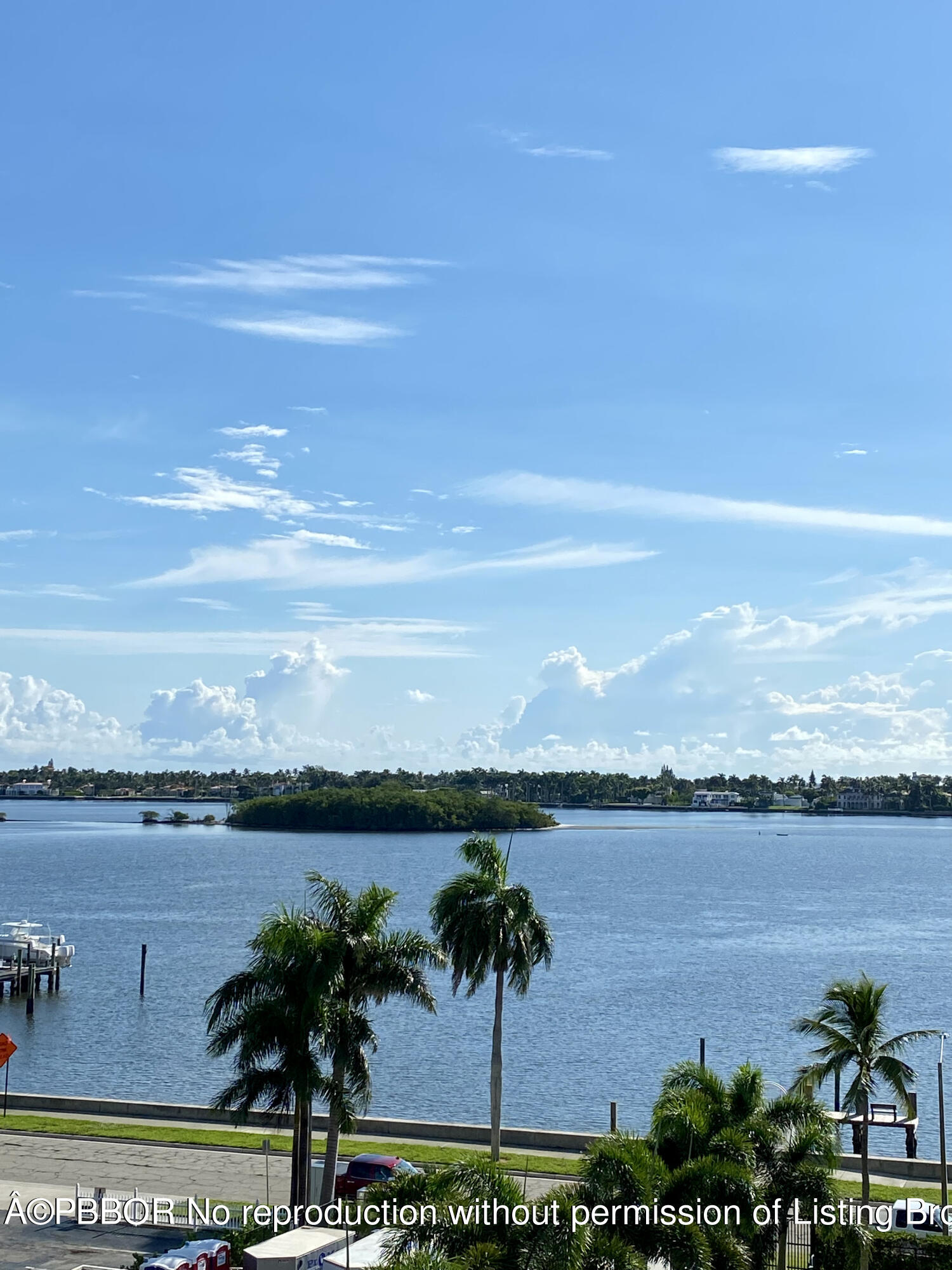 3800 Washington Road, Unit 610 West Palm Beach, FL 33405 - Photo 1 of 13 a view of a lake with a beach