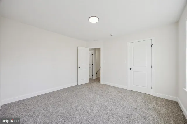 a view of a room with an empty space