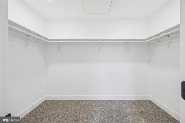 a view of a room with a large window