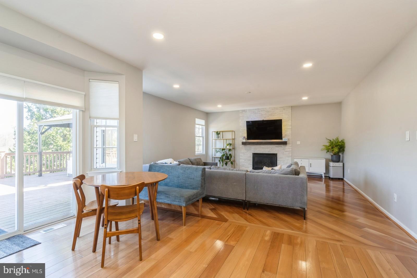 32 Moorsgate Circle Hightstown, NJ 08520 - Photo 15 of 49 a living room with furniture and a flat screen tv
